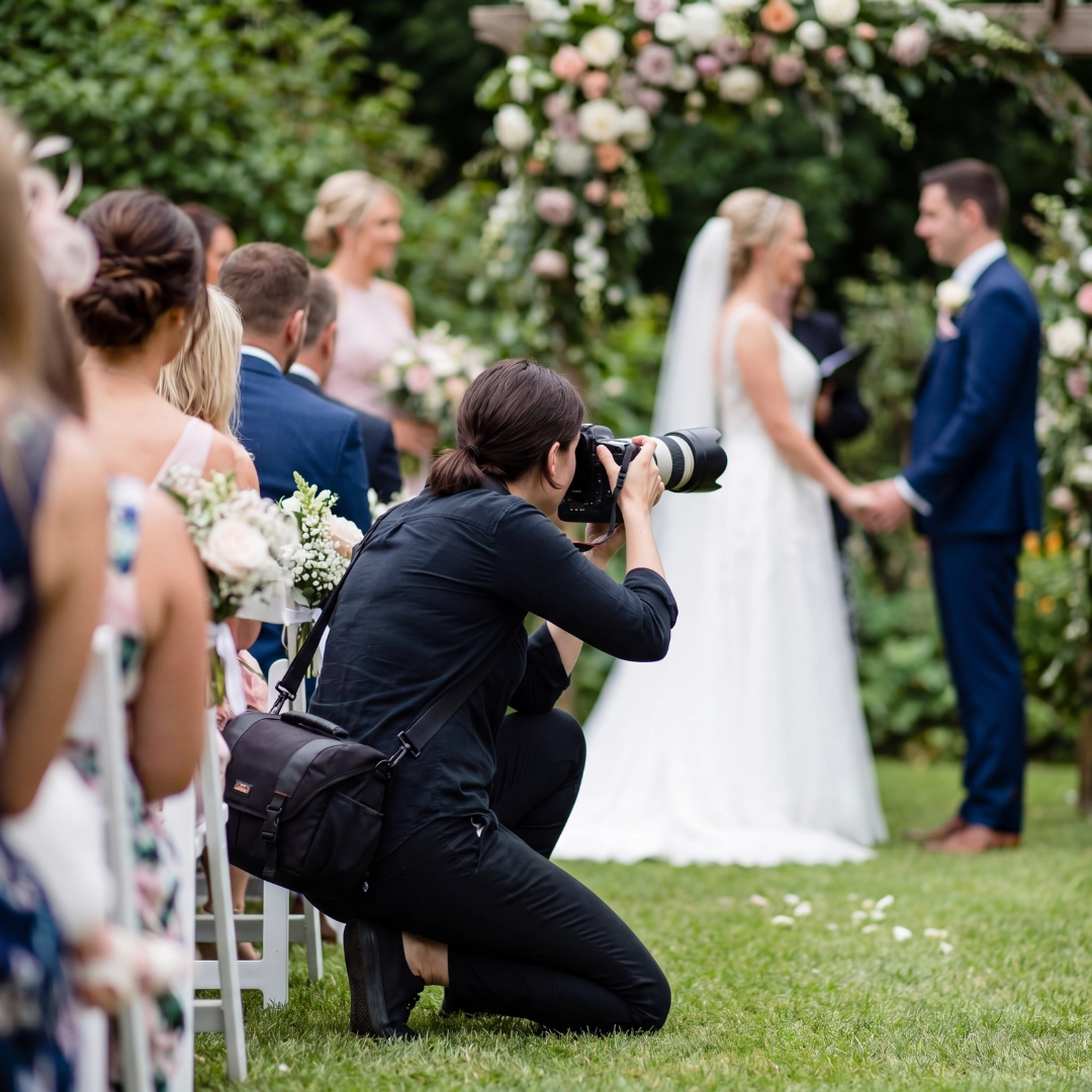 Wedding photographer capturing a couple on their wedding day